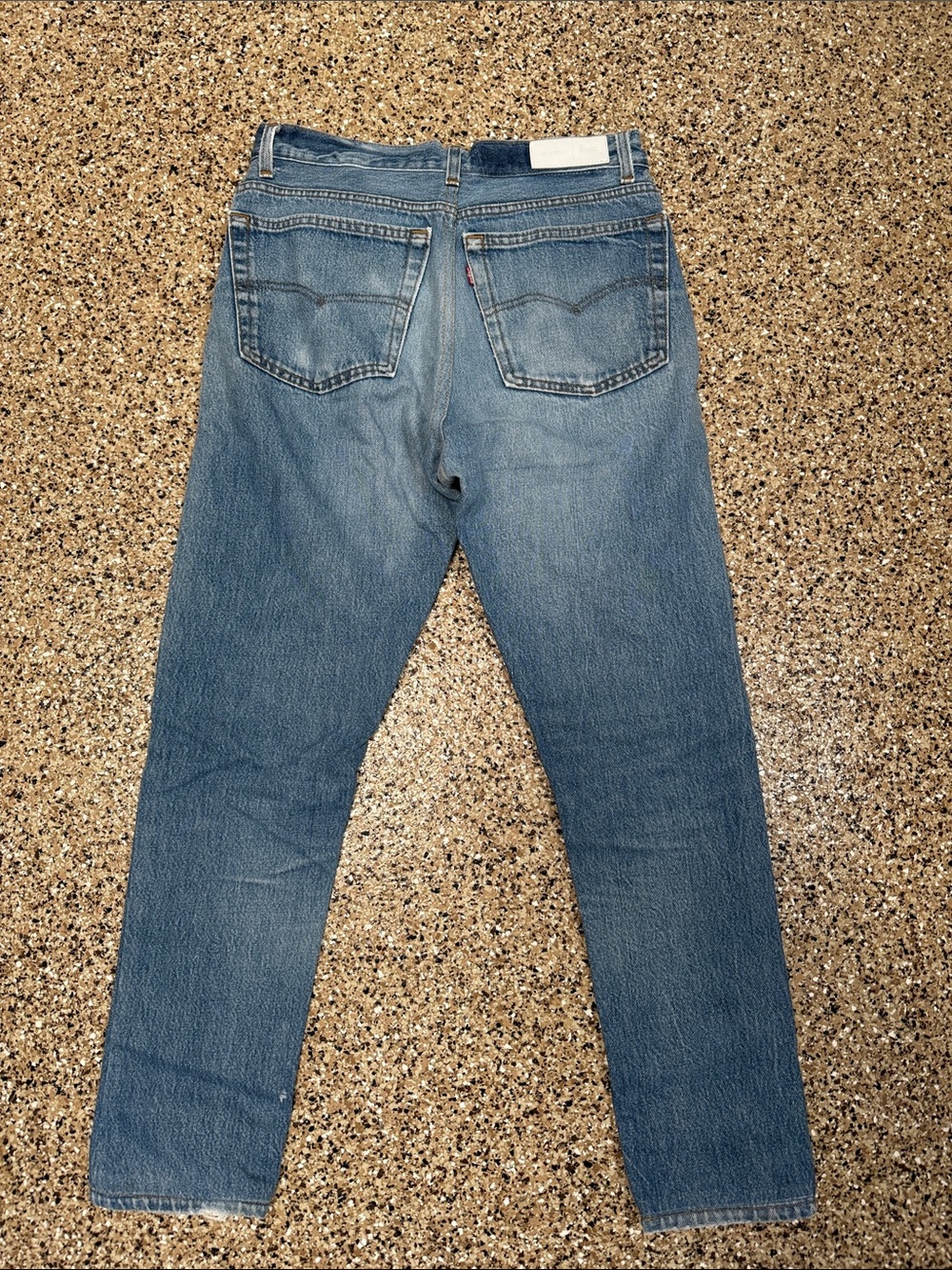 Re/Done Slim Straight Light Blue Jeans with Knee Rip